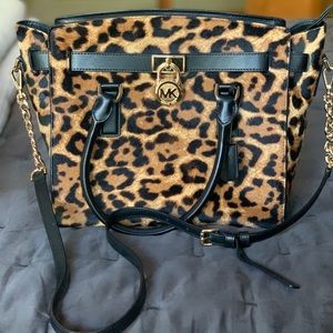 Michael Kora leopard print bad.